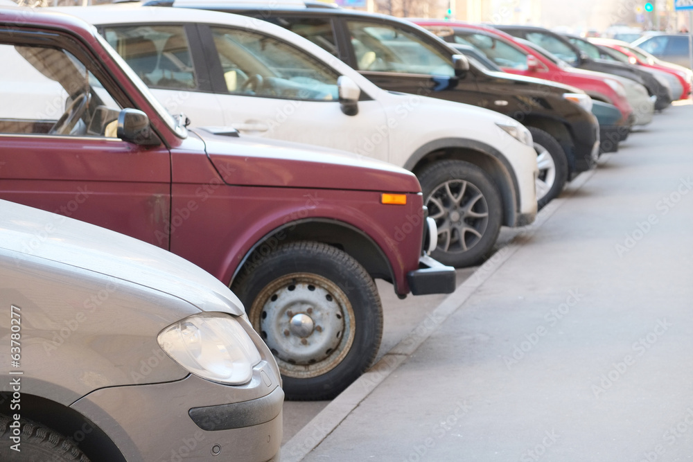 vehicles parked in parking lot vehicles parked in parking lot