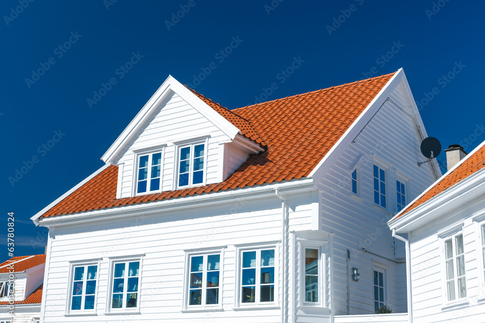 Traditional white wooden house in Norway Traditional white wooden house in Norway