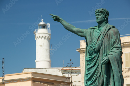 nero statue and lighthouse in Anzio, Italy photo