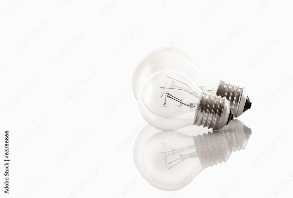 two light bulbs isolated on white with reflects