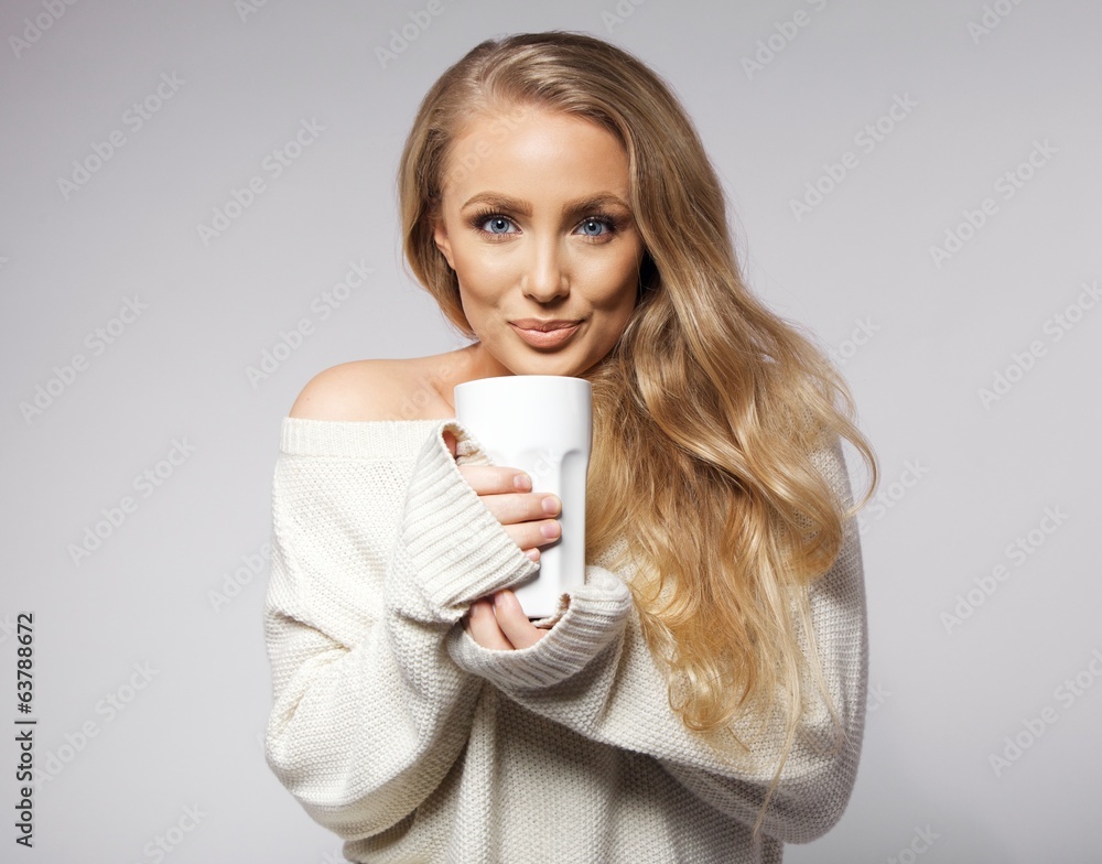Cute young woman drinking coffee Cute young woman drinking coffee