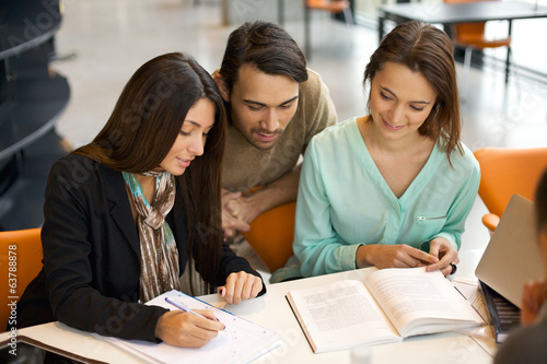 Students engrossed in their studies at library