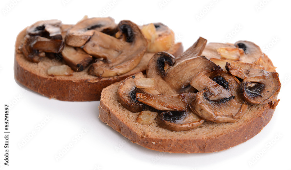 Delicious bruschetta with mushrooms isolated on white Delicious bruschetta with mushrooms isolated on white