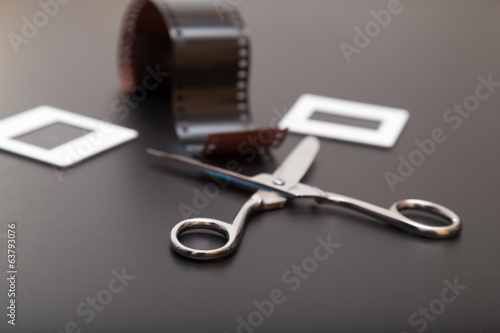 Slide , reversal film and scissors