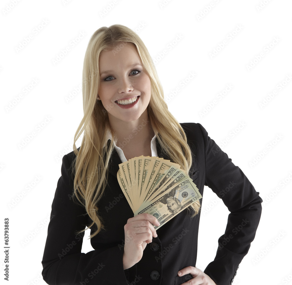 Confident young businesswoman holding currency notes and smiling Confident young businesswoman holding currency notes and smiling