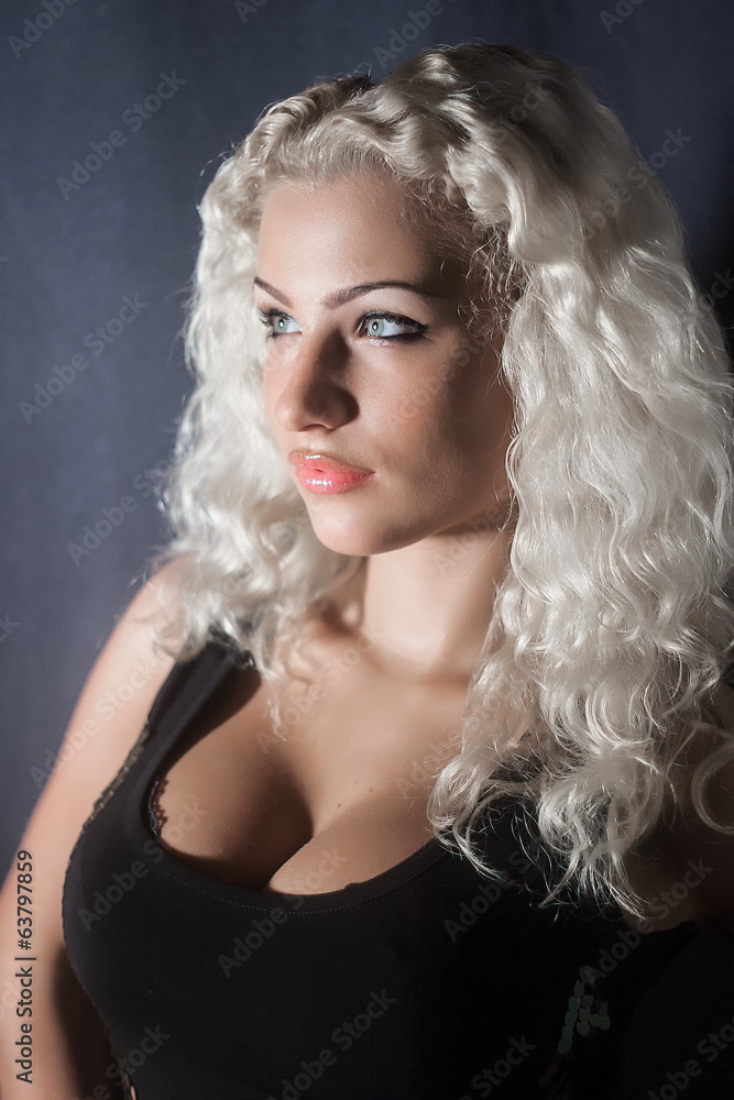 Fototapeta premium Young attractive woman with a white hair in the studio