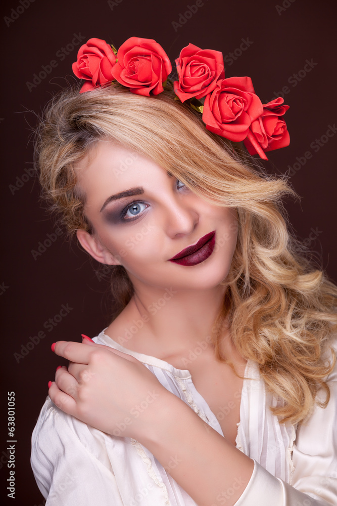 Smiling woman with flowers in head