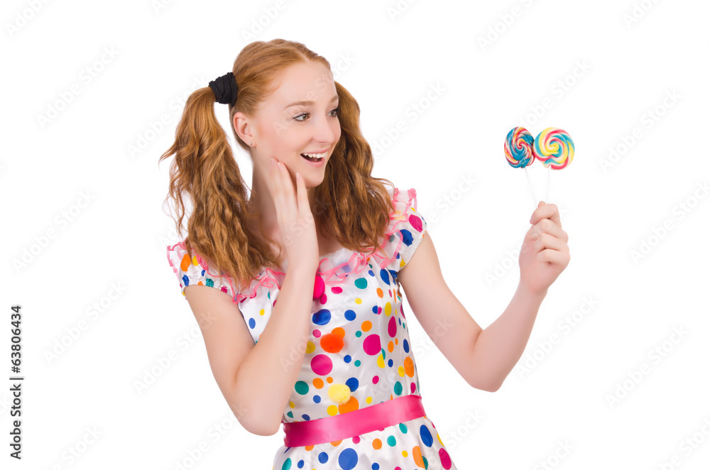 Redhead young girl with lolipops isolated on white Redhead young girl with lolipops isolated on white