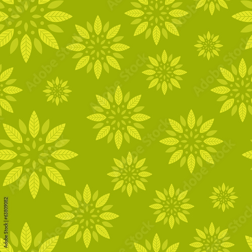 Seamless leaves rosette background in green and yellow colors.