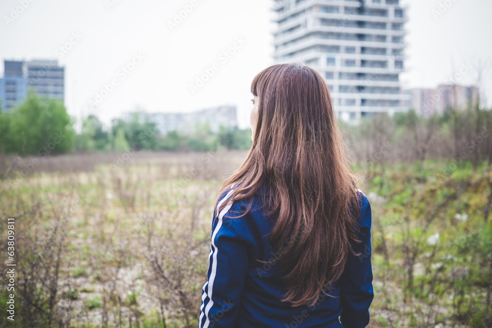 beautiful woman in a desolate landscape beautiful woman in a desolate landscape