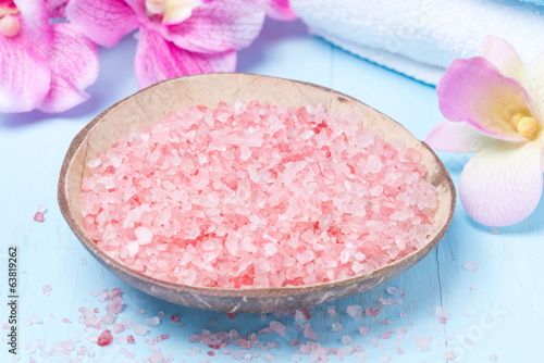 pink sea salt, flowers and towels for the spa