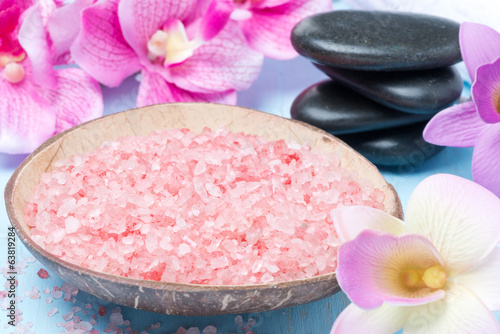 pink sea salt, stones for spa, flowers and towels