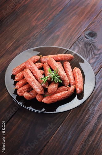 Smoked sausages on plate