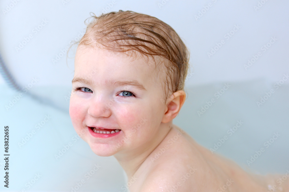 Sweet baby girl swimming in the bath Sweet baby girl swimming in the bath