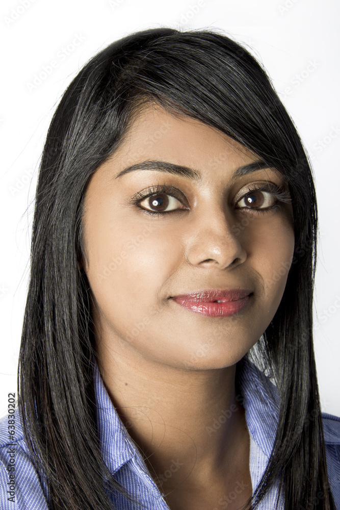 Pretty young Indian Woman in work clothes Pretty young Indian Woman in work clothes