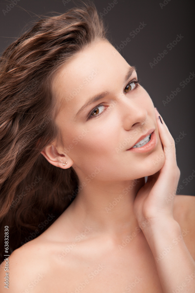 Portrait of beautiful sexy female model on dark background Portrait of beautiful sexy female model on dark background