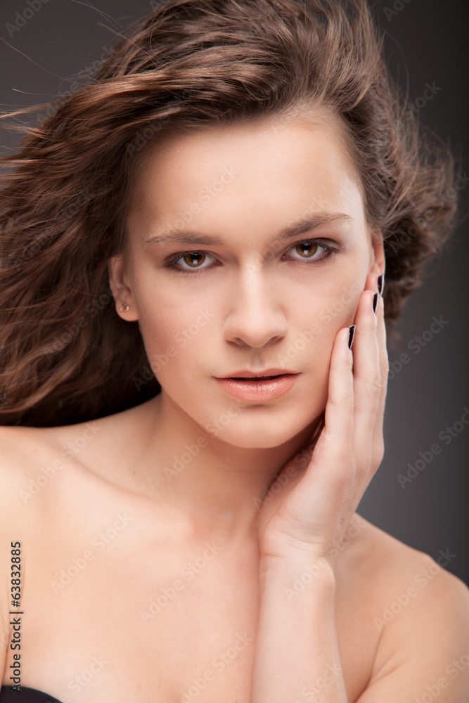 Portrait of beautiful sexy female model on dark background Portrait of beautiful sexy female model on dark background