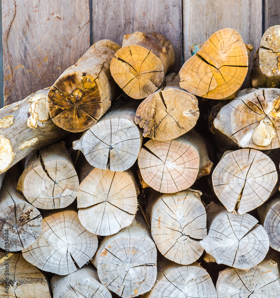 Fototapeta premium firewood on wood background