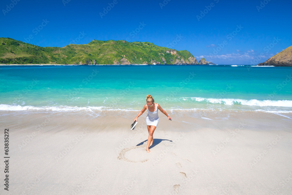 young woman on tropical beach