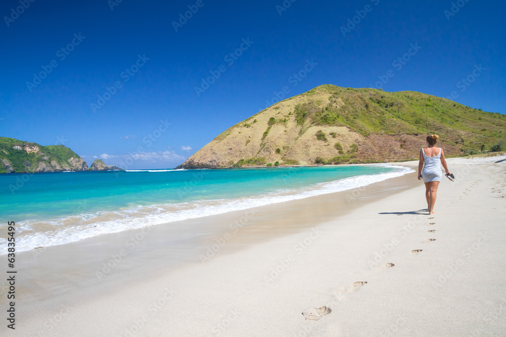 young woman on tropical beach