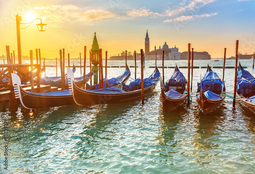 Venetian gondolas at sunrise © sborisov