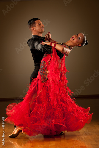 Fotografie, Obraz Professional ballroom dance couple preform an exhibition dance