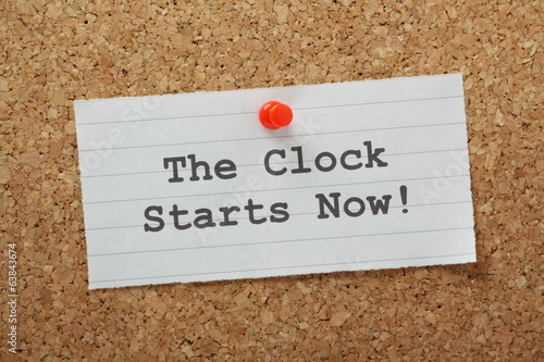 The Clock Starts Now on a cork notice board