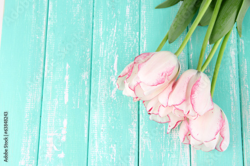 Fototapeta Naklejka Na Ścianę i Meble -  Beautiful tulips on color wooden background