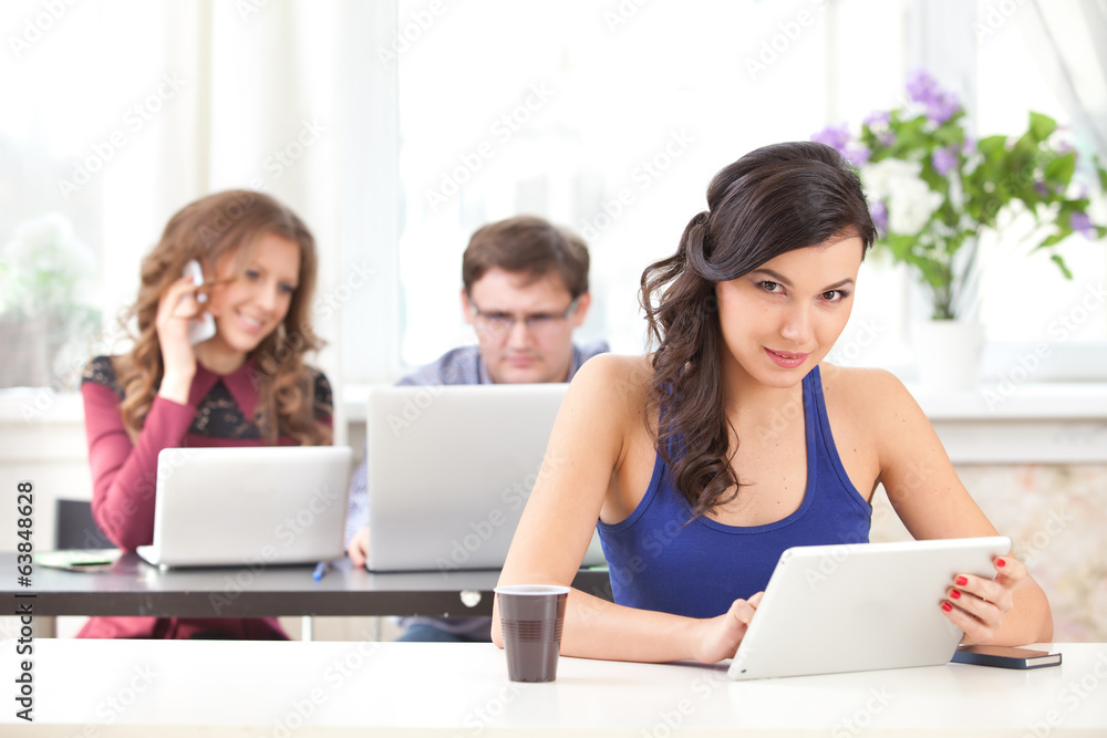 smiling young girl with tablet in cafe smiling young girl with tablet in cafe