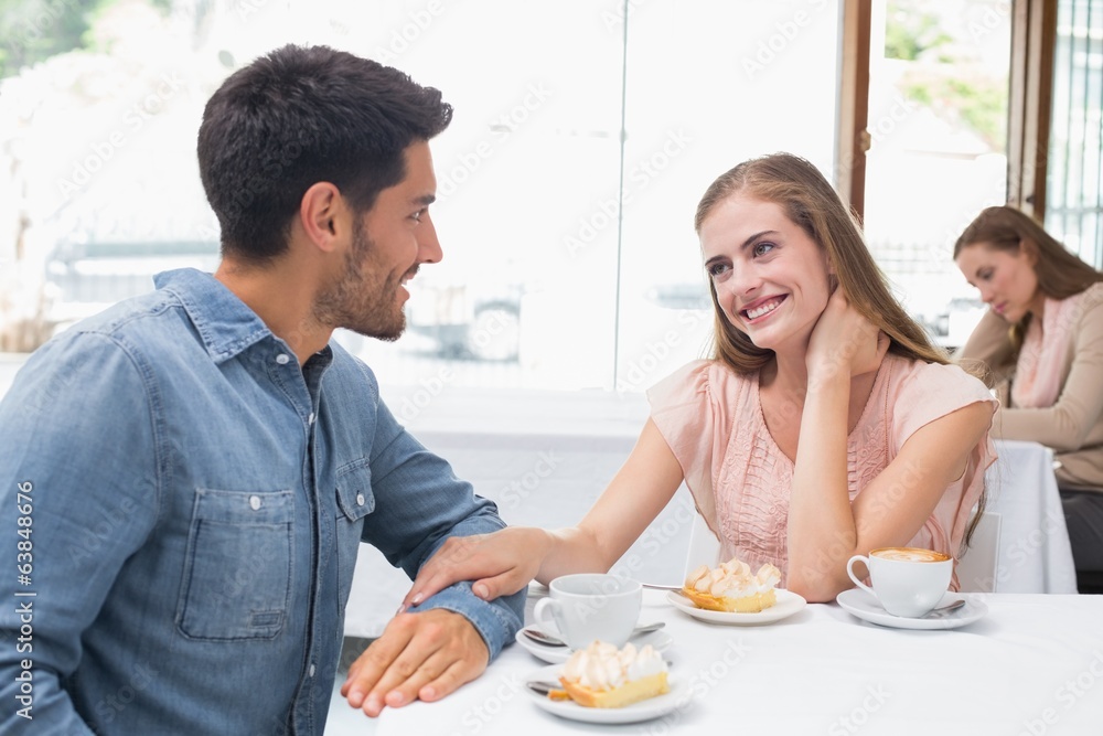 Couple sitting at coffee shop