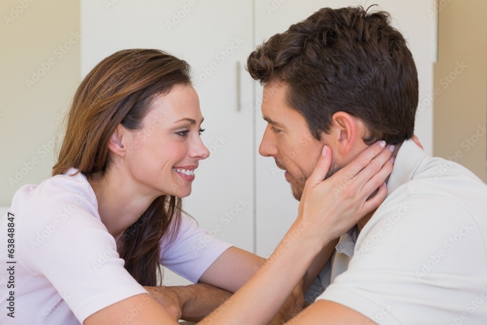 Loving young couple looking at each other Loving young couple looking at each other