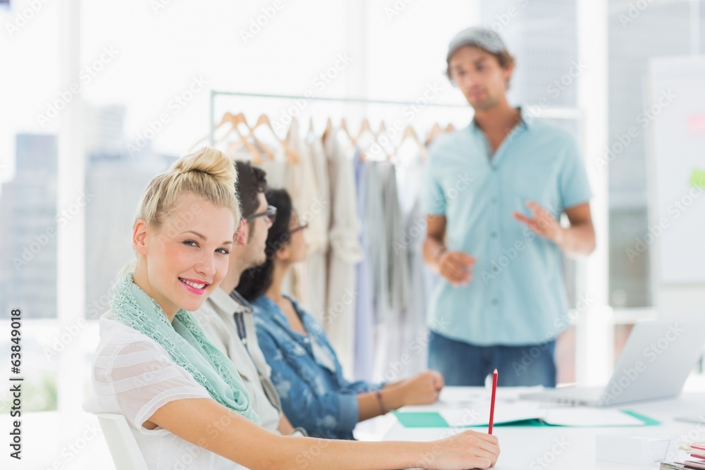 Obraz premium Fashion designers discussing designs