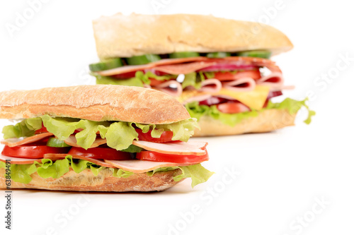 Sandwiches with ham and tomato.