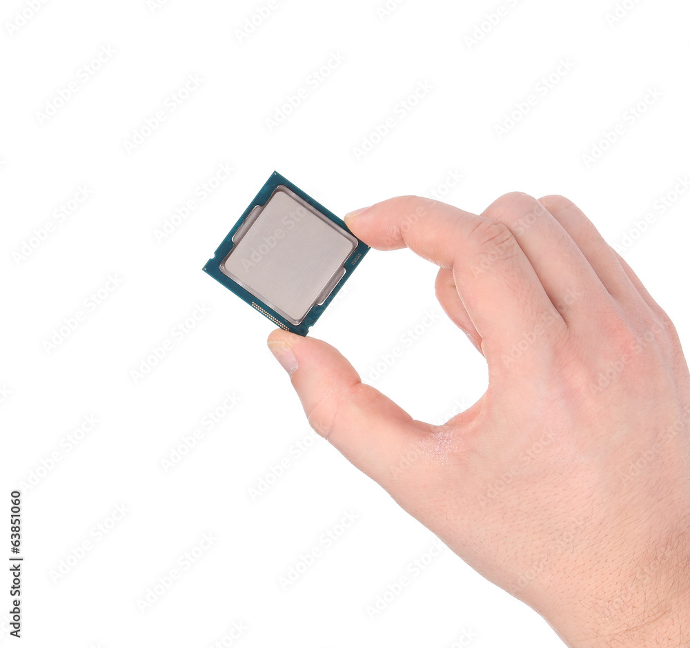 Hand holding a computer CPU chip. Hand holding a computer CPU chip.