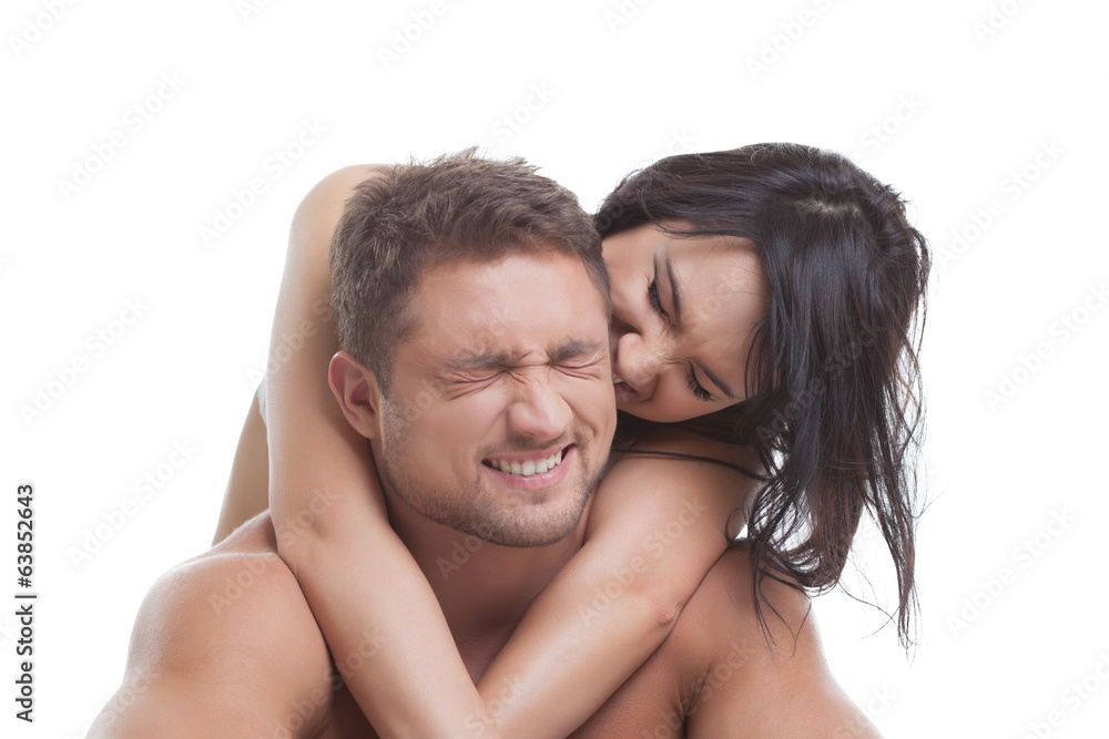 Portrait of happy couple embracing in studio Portrait of happy couple embracing in studio