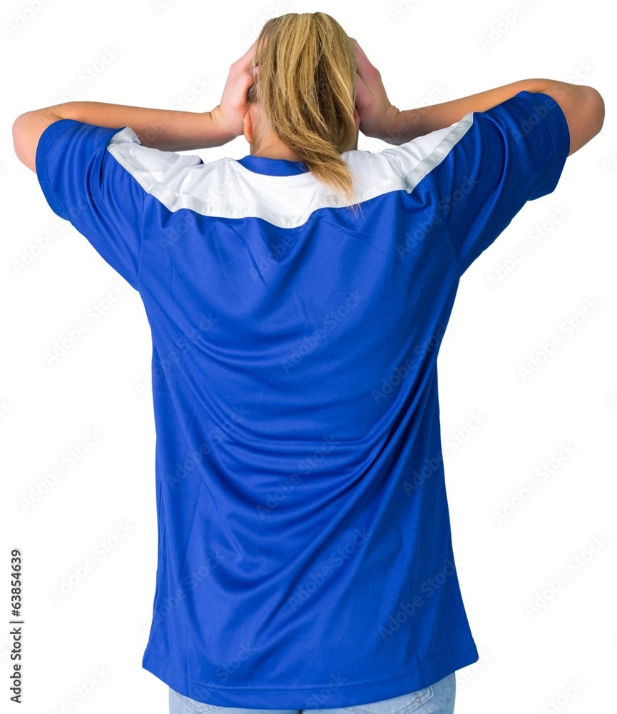 Disappointed football fan in blue Disappointed football fan in blue