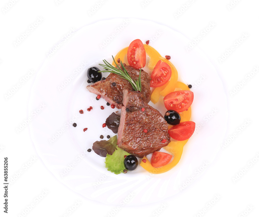Grilled steak with fresh vegetables. Grilled steak with fresh vegetables.