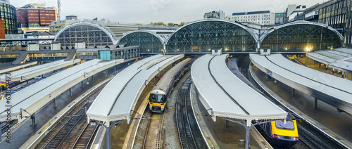 Train leaves Paddington railway station in London, UK, panorama