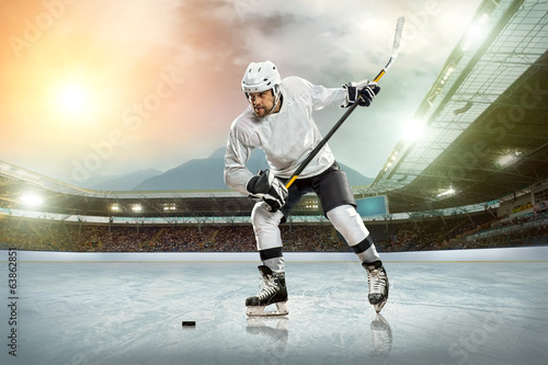 Ice hockey player on the ice. Open stadium - Winter Classic game
