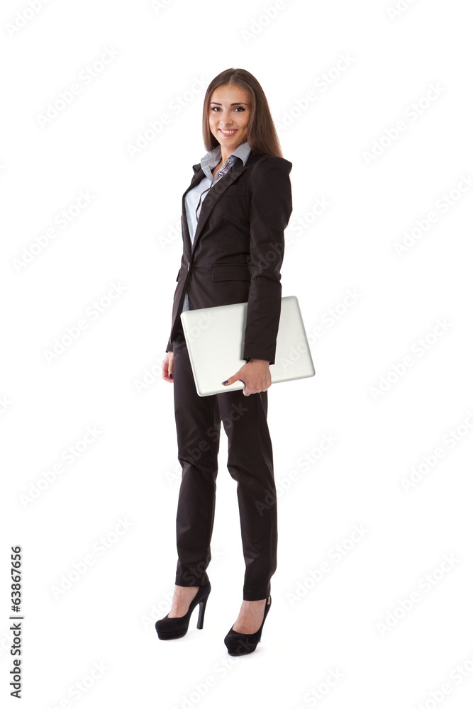 Business woman with laptop standing in full length isolated on w Business woman with laptop standing in full length isolated on w