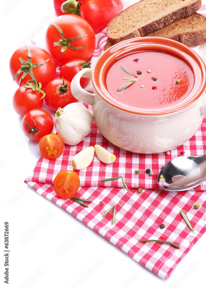 Tasty tomato soup and vegetables, isolated on white Tasty tomato soup and vegetables, isolated on white