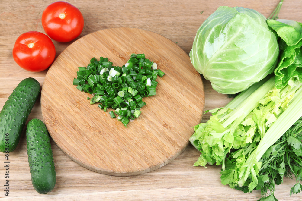 Heart shape of chopped herbs  and fresh vegetables,