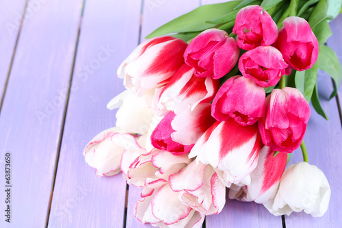 Fototapeta Naklejka Na Ścianę i Meble -  Beautiful tulips on color wooden background