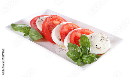 Tableau sur toile Caprese salad with mozarella cheese, tomatoes and basil