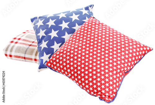 Bright pillows and plaid isolated on white