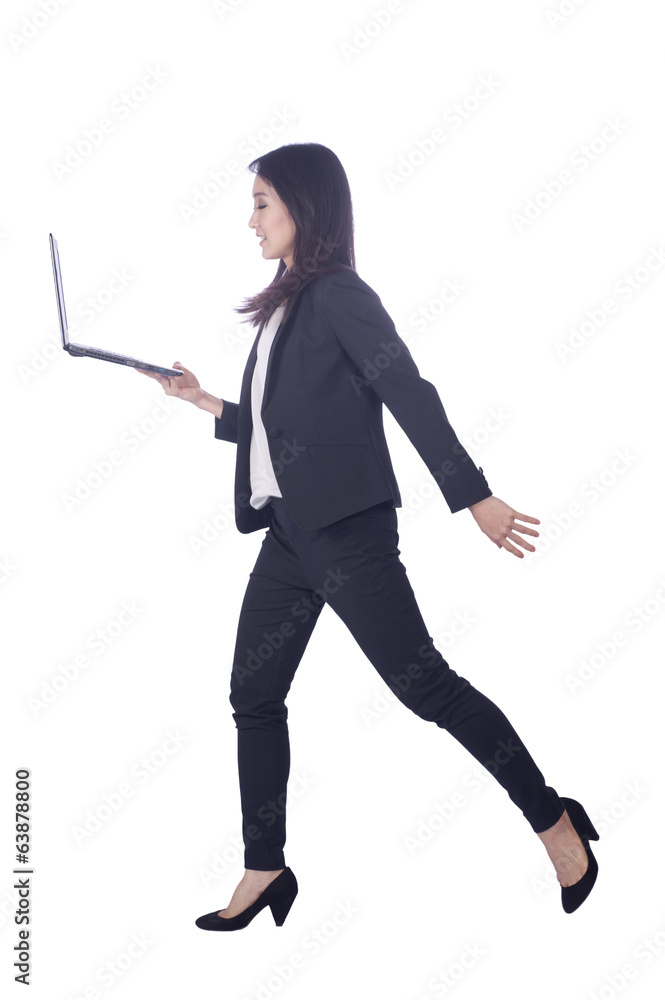 Business woman and laptop - isolated over a white background Business woman and laptop - isolated over a white background