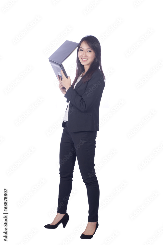 Business woman and laptop - isolated over a white background Business woman and laptop - isolated over a white background