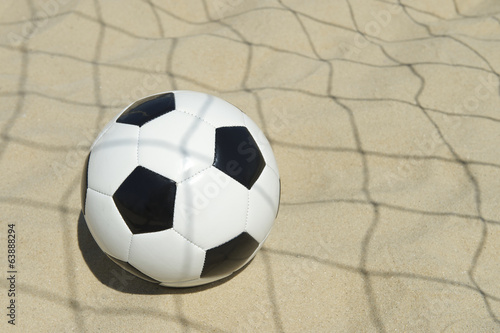 Soccer Ball in Football Net Shadows Brazil Beach © lazyllama