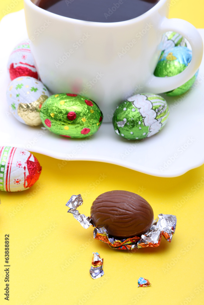 Chocolate Easter eggs and coffee - obrazy, fototapety, plakaty 
