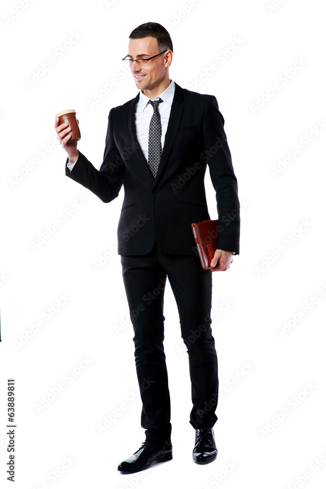 businessman holding cup of coffee and tablet computer businessman holding cup of coffee and tablet computer